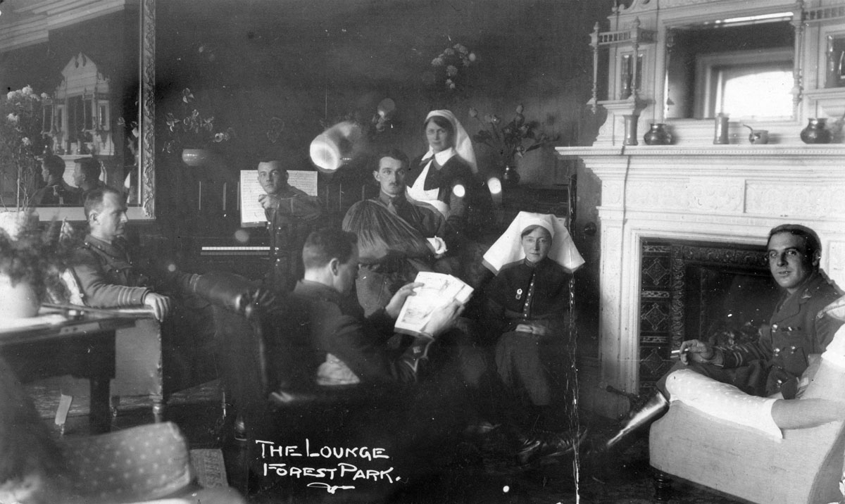 New Zealand soldiers and nurses relax in a lounge at Forrest Park Hotel, No.1 General Hospital, Brockenhurst, England.
